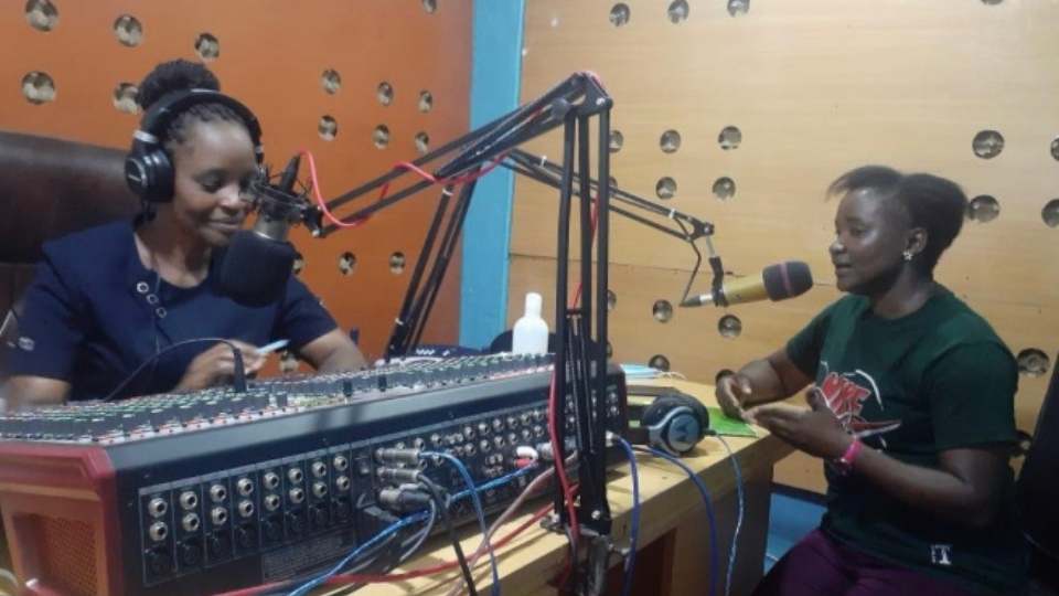 You are currently viewing Director of Gender talks on the radio about where girls and women can go to get help, Migori County, Kenya